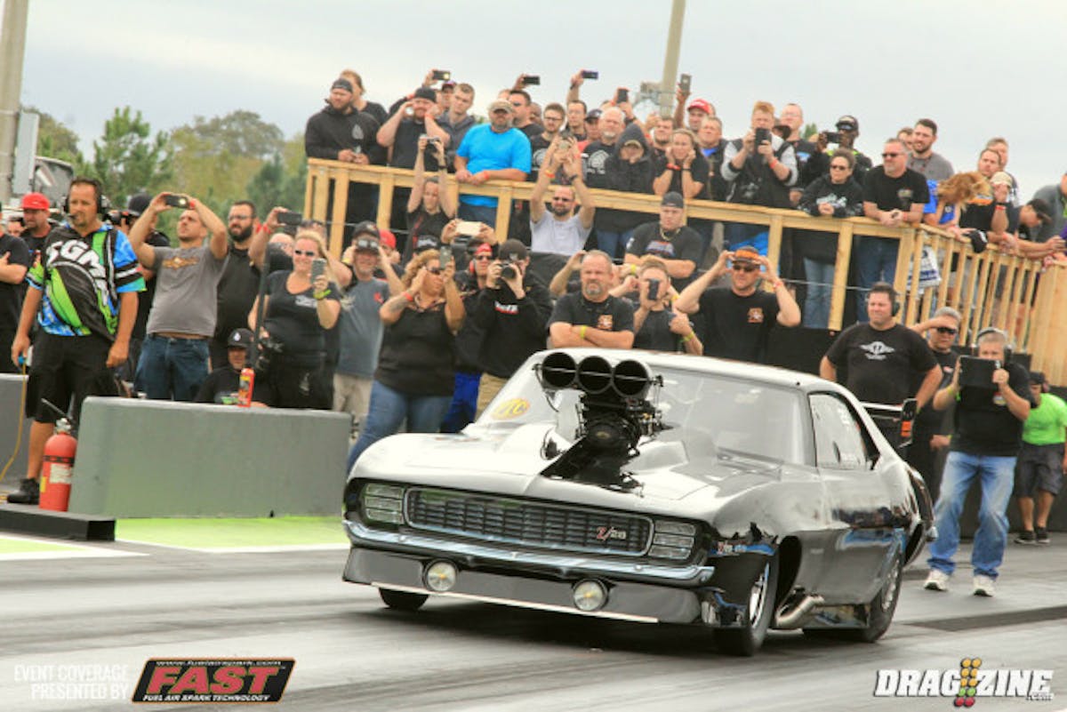Barry Mitchell is running well with his new combo built by Tim McCamis Race Cars powered by BAE Hemi topper with a Hammer Superchargers Roots blower tuned by Todd Tutterow. He did not improve this session but was fifth last night with a 3.84 at 189. Today's third round hit was a 3.87 at 191. He has been as fast as 196 MPH this weekend.