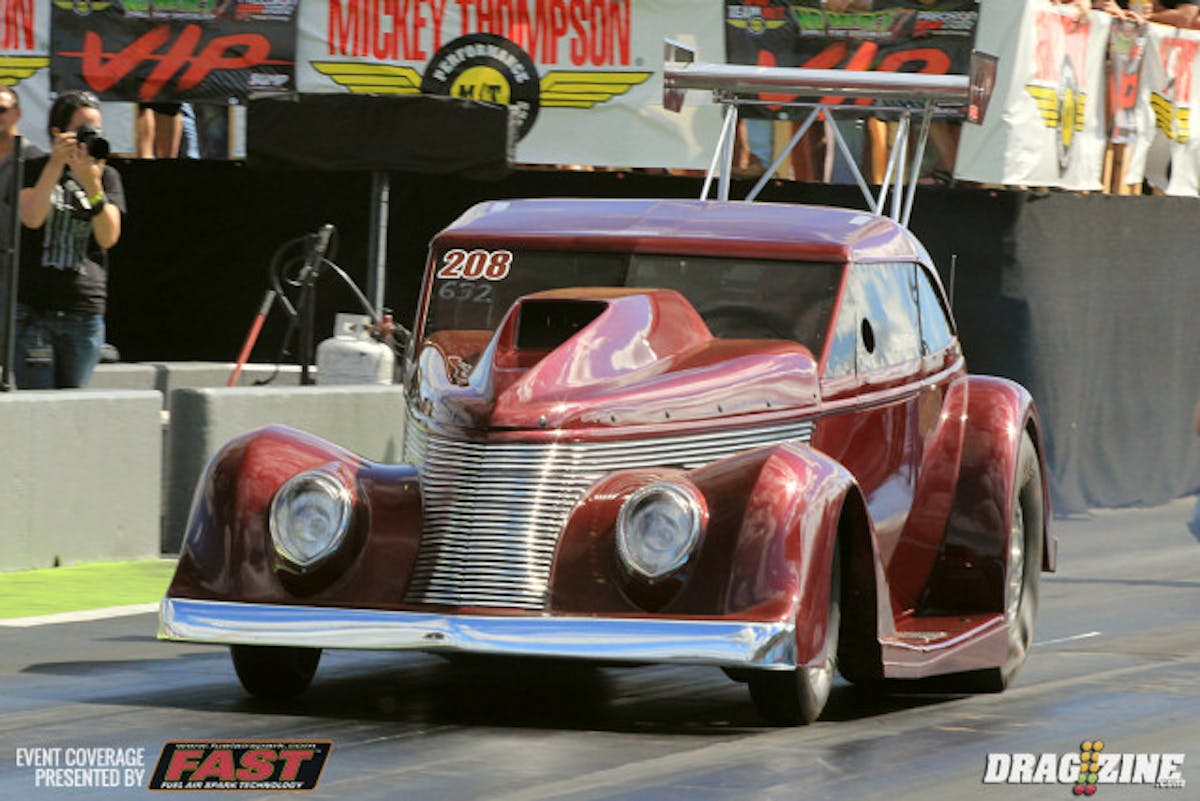 Mike Oldham is sporting new paint on his Suncoast Chassis built ride. He was sitting out of the field with a 5.11.