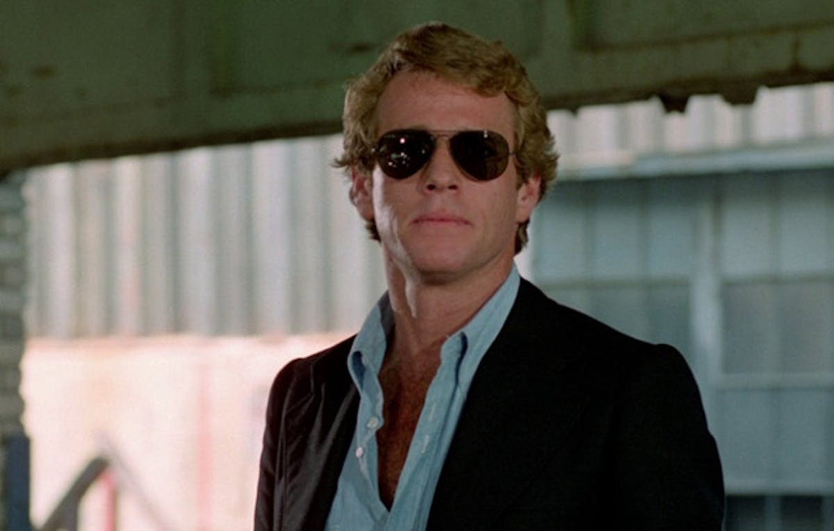Ryan O'Neal as the Driver.