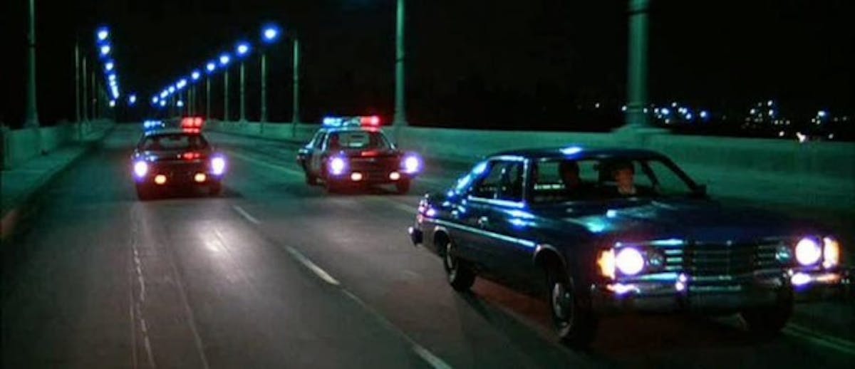The opening car chase with the Driver behind the wheel of a Ford Galaxie 500.