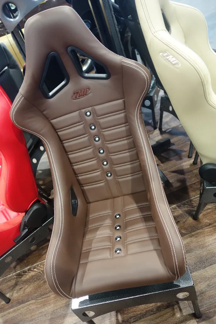 TMI also offers this sweet, fixed-back race seat, which only tips the scales at 24 pounds with a bracket. We checked it out. It is snug and comfy.