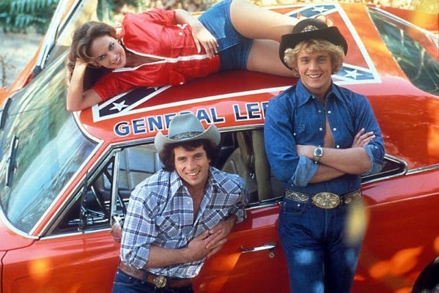 Representing the popular television series, the Dukes of Hazzard, its cast included Catherine Bach as Daisy, Tom Wopat as Luke, and John Schneider as Bo. Photo courtesy of CBS Television.