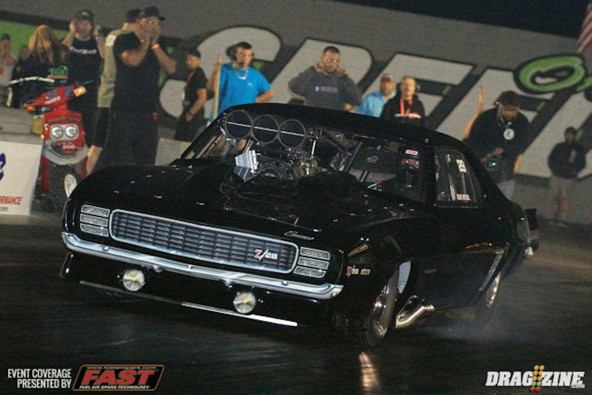 Barry Mitchell leads the Outlaw 10.5 vs Pro Radial class with a 3.91 at 192. He pedaled the car once early on the run.
