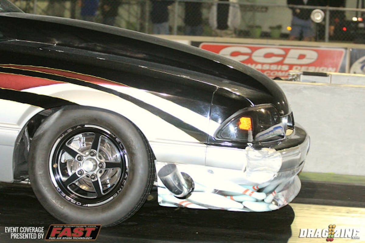 Limited Drag Radial racer Scott Husted had a close call after getting lose on his attempt. Looked like the rear tires were skipping some, not quite into shake and kicked the rear to the left. he got into a slide and spun nearly 180 degrees before tapping the wall with the edge on the nose. That'll buff out.