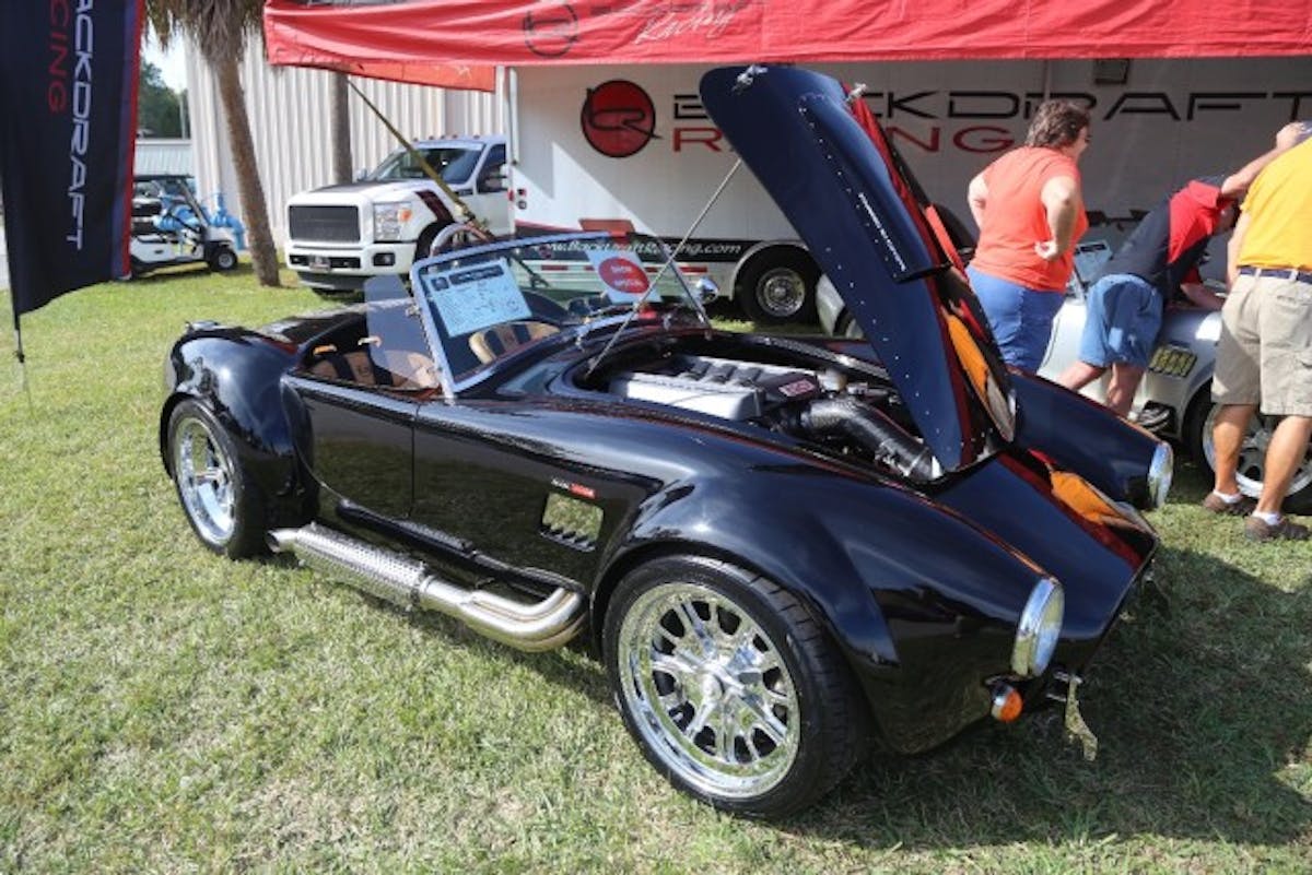 One of the first Ford-powered vehicles we spotted on the Fall Autofest midway was this stunning Backdraft Racing Replica Roadster. It features a Ford Performance Coyote crate engine underhood, which is backed by a Tremec five-speed manual. This RT3 chassis is loaded up with options like custom paint, ceramic-coated headers and power steering. It will set you back $66,057, but it looks like a total blast to drive.