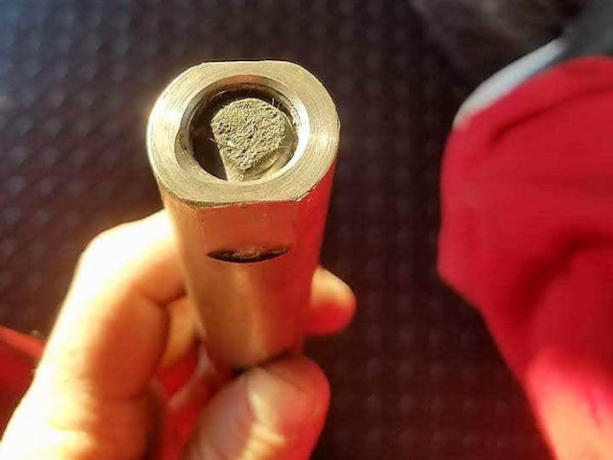 The culprit of the crash, the broken heim joint in the wishbone assembly. As you can see, it broke past the edge of the sleeve, which is why it wasn't caught when Davis and his crew inspected the car after the first crash.