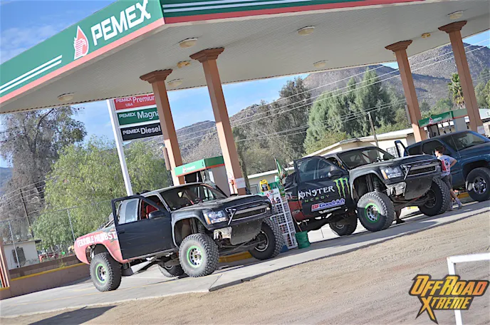 If you thought having to stop at a gas station on a road trip was rough, you should see it in a prerunner. After every section depending on length the trucks would be splashed with fuel from the chase truck or head to the gas station to fill up.