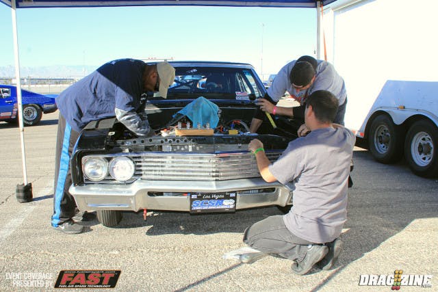 There is a bunch of unique cars out west and this 65 Skylark convertible owned by Gary Giessen from Escondino, CA is a prime example. He is running 275 Drag Radial this weekend though normally doesn't do class racing but for here at the SCSN. This is yet another racer who has had his car for an exceptionally long time which he purchased in 1989 and is the third owner. It's powered by a big block Buick from Finishline Motorsports back in Michigan topped with two stages of Induction Solutions foggers though is on one stage. He has been 5.60s best but has struggled here this weekend with a best of 6.40.