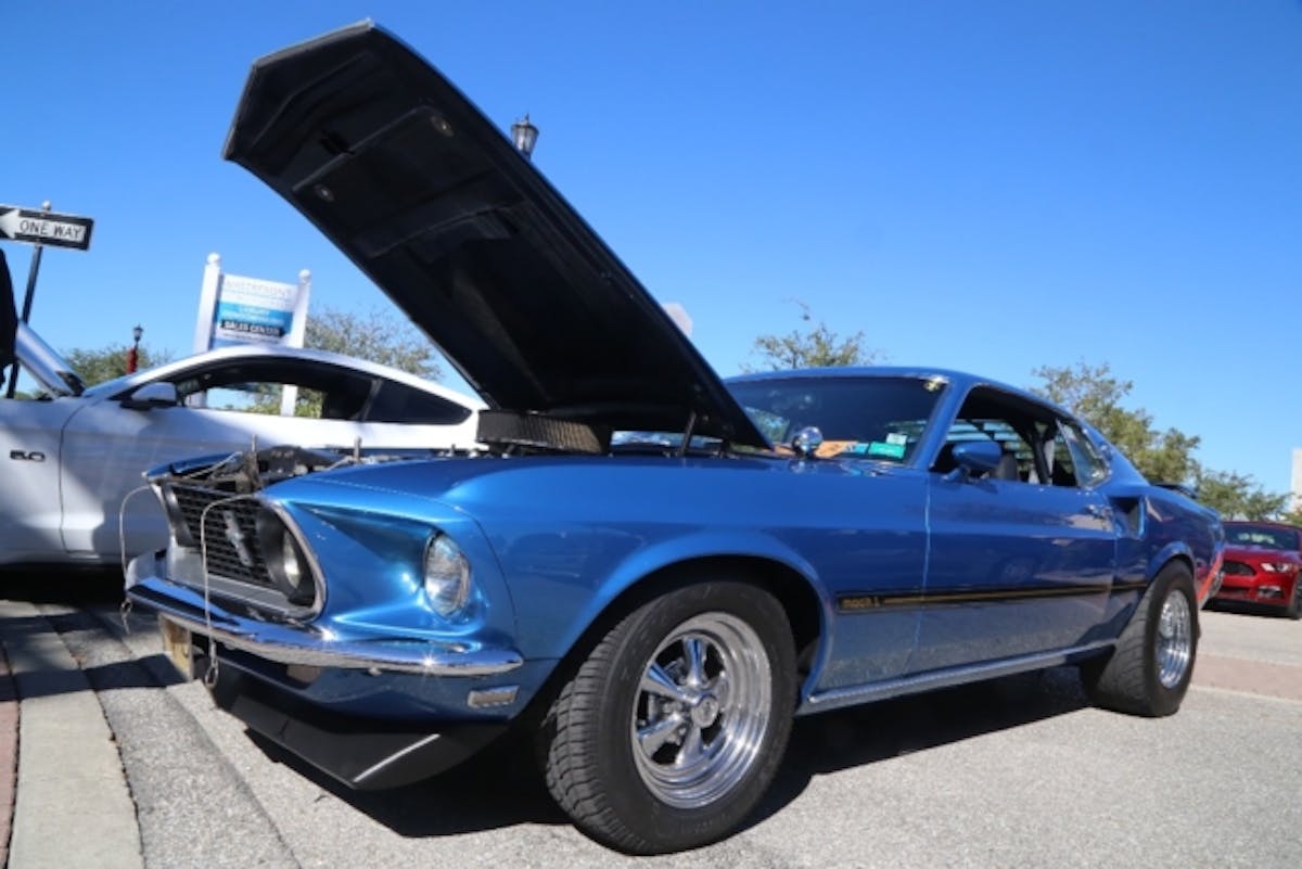 George Okada rolled into the show with his nicely modded 1969 Mach 1. The Acapulco Blue Fastback has a Hawaii Racing small-block underhood, cowl-mounted tach and some period-correct Cragars.