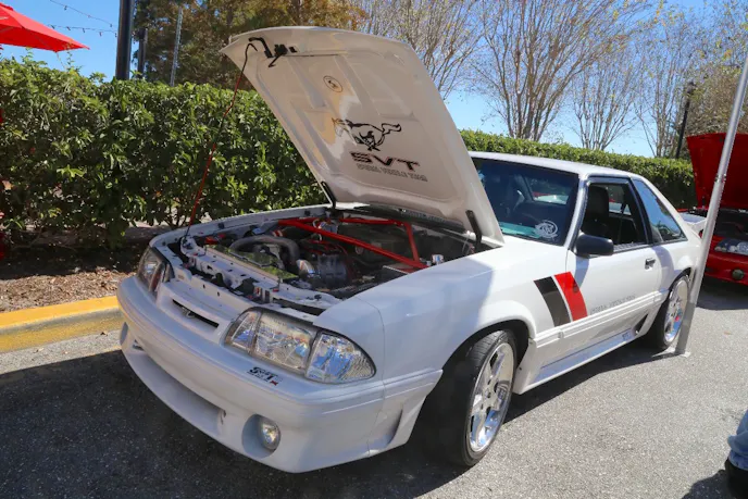 Our pal John Nall brought his SVT-themed 1993 Mustang GT out to the show. Its bolt-on 5.0-liter engine is topped by an Edelbrock Performer RPM II intake and inside his Fox is highlighted by a custom audio system.
