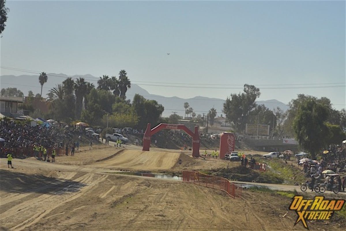 The beginning of the race course maybe quiet, but the lines of people will soon be entertained by the roar of horsepower through the wash.