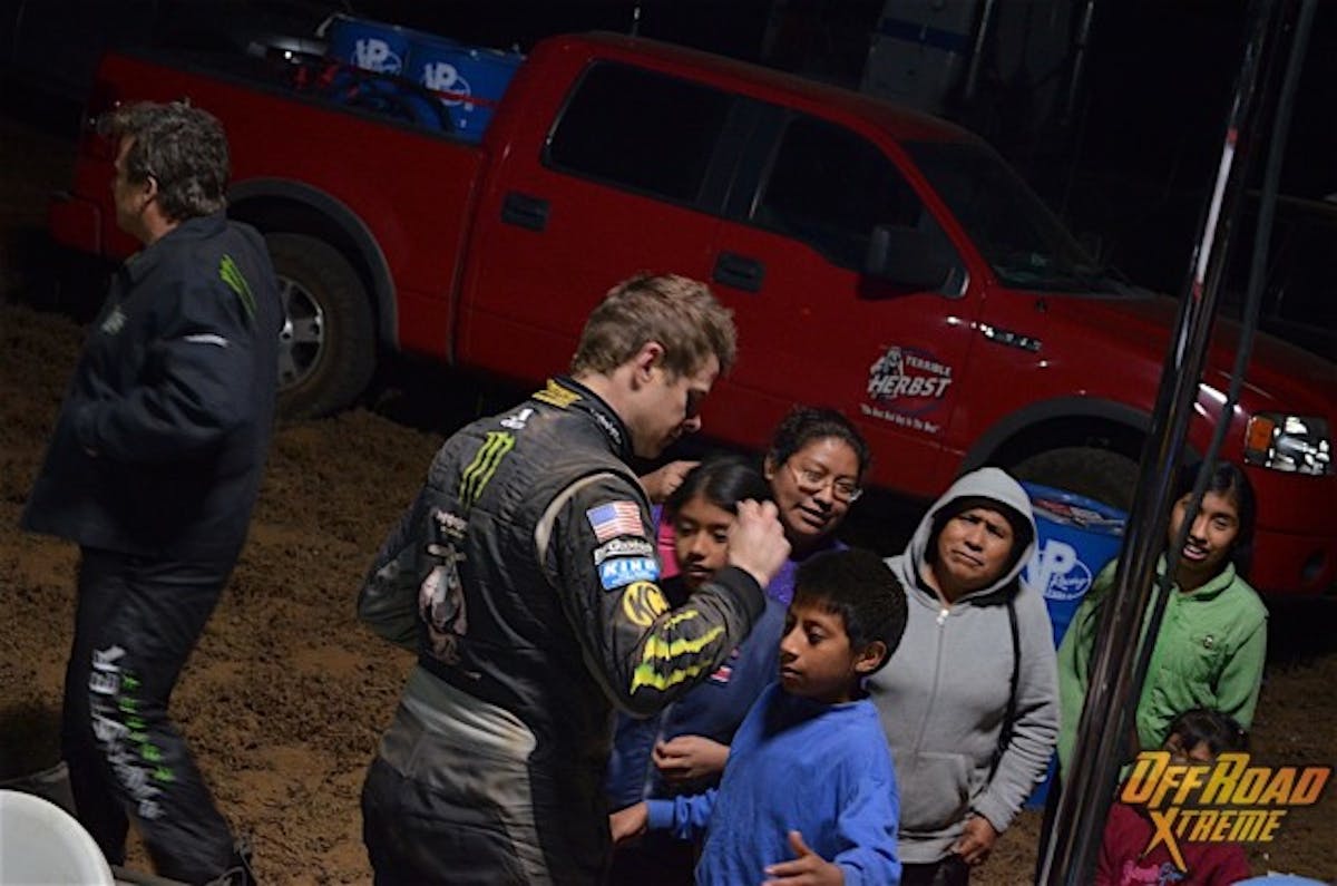 The other side of Baja. Ryan Arciero great a group of local fans after getting out of the truck.