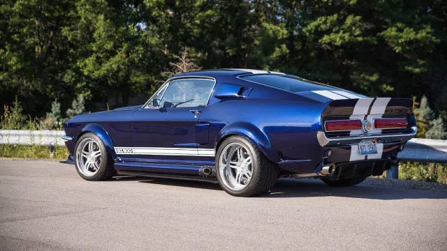 The GT500 SuperSwap features a custom exhaust that includes QPT electric exhaust cutouts that feed the side-exit pipes and Magnaflow mufflers that control the sound out back.
