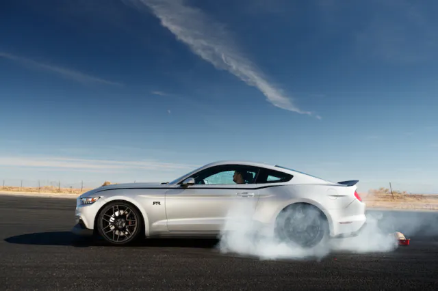 Drift star Vaughn Gittin Jr. loves to have a good time. To spread the Thanksgiving spirit and show off the Ford Mustang’s line lock feature, JR ‘smoked’ a turkey with his Nitto NT-555 G2 tires. (Photo Credit: Mustang RTR)