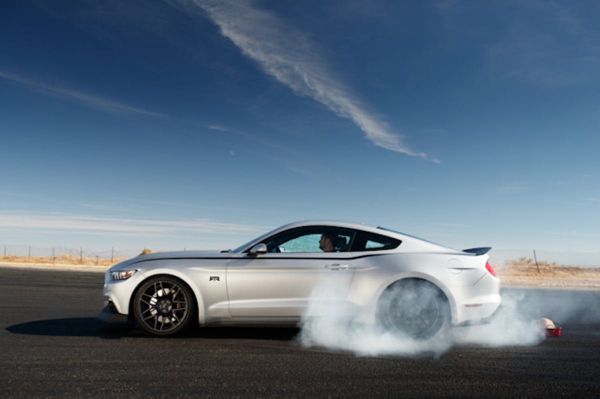 Drift star Vaughn Gittin Jr. loves to have a good time. To spread the Thanksgiving spirit and show off the Ford Mustang’s line lock feature, JR ‘smoked’ a turkey with his Nitto NT-555 G2 tires. (Photo Credit: Mustang RTR)