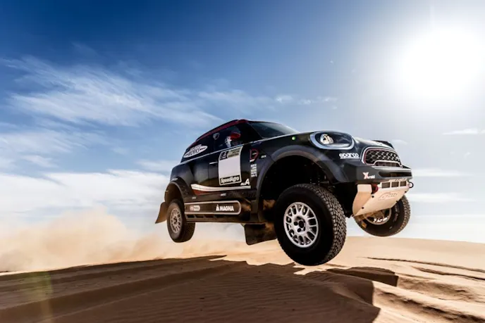 Seen here prior to the RedBull sponsorship, the MINI John Cooper Works Rally racecar has a top speed of over 100mph in the dirt.