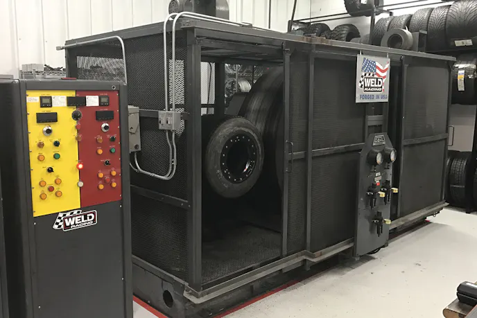 Here a Sprint Car wheel is prepped for the Radial test. This places a load on the wheel and tire at twice the wheel's official spec for approximately four days straight as the drum spins at 55 mph.
