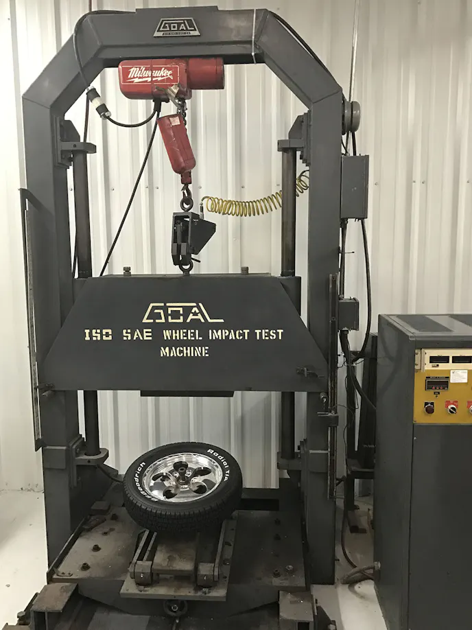 The Drop test - also known as the impact test - replicates the forces applied on a wheel if a driver hit a curb with it on their vehicle. A weight is dropped so that half the impact is made on the wheel and the other half on the tire. This type of testing is particularly important for cast wheels, as they're more prone to cracking than forged wheels are.
