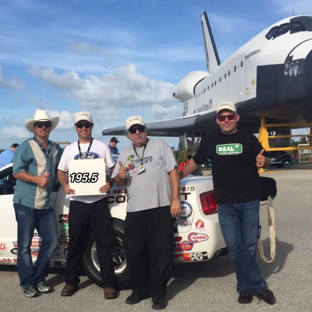 Though they were clearly stoked to set a record, this crew—(from left to right) Chris Johnson, Eric Raymer, Rick Hernandez and Jay Meagher—will certainly be back out to try and run even faster with this class-legal Cobra Jet.