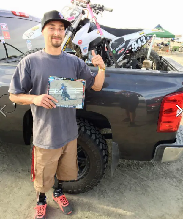 Jesse standing with his truck after completing the Lake Elsinore Grand Prix in the 450 intermediate class.