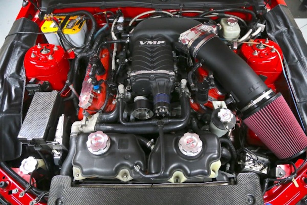 Here’s a look at the completed installation on BJ McCarty’s 2007 Shelby GT500, affectionately named Christine. She has been the test bed for numerous VMP TVS upgrades including the Gen2 and Gen2R supercharger. BJ’s 5.4-liter engine is upgrade with Dynatech headers, a VMP heat exchanger, a VMP custom calibration and the necessary fuel system upgrades.