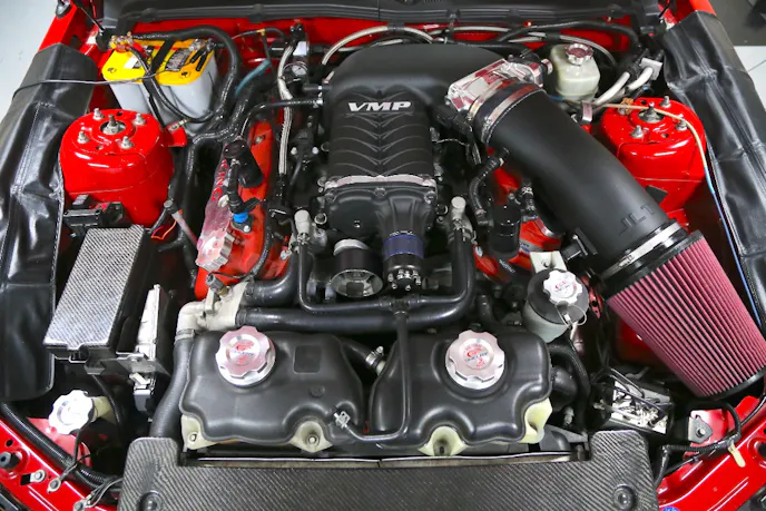 Here’s a look at the completed installation on BJ McCarty’s 2007 Shelby GT500, affectionately named Christine. She has been the test bed for numerous VMP TVS upgrades including the Gen2 and Gen2R supercharger. BJ’s 5.4-liter engine is upgrade with Dynatech headers, a VMP heat exchanger, a VMP custom calibration and the necessary fuel system upgrades.
