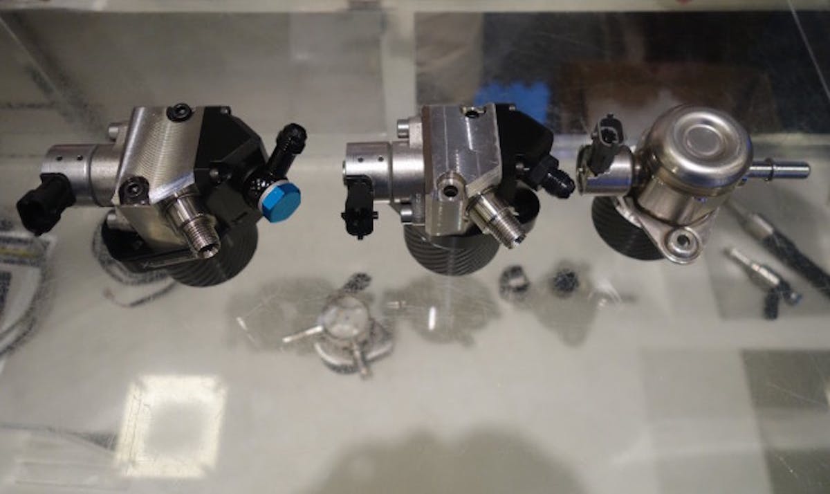 From left to right are the Xtreme DI pumps and a stock Bosch pump from a Taurus SHO. You can see that the replacement pumps are much larger and more robust than the factory pump.