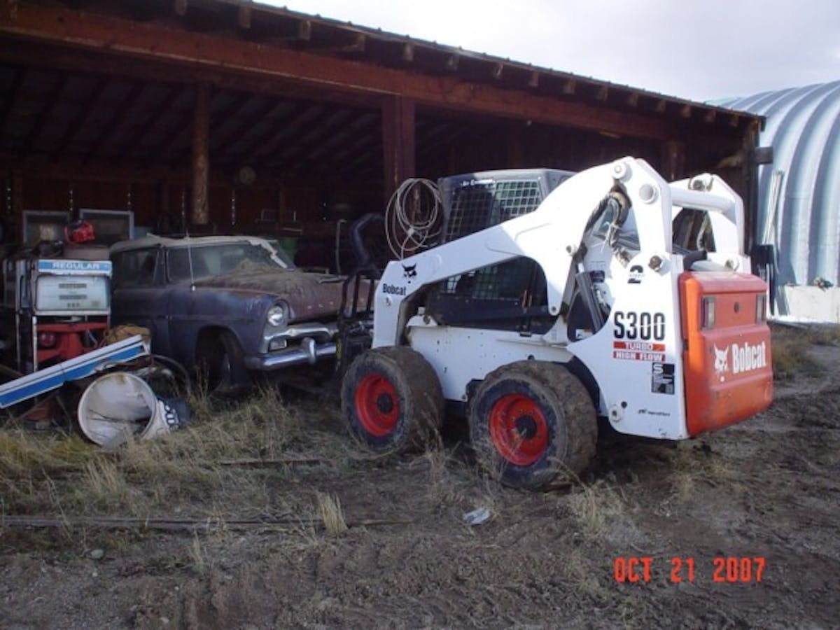 Well, that’s certainly one way to remove a car from a shed! 