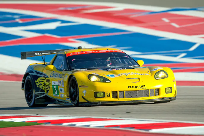 Antonio Garcia and Jan Magnussen, drivers of the #3 Compuware Corvette C6.R, race to victory Saturday, September 21, 2013 in the GT Class of the American Le Mans Series race at Circuit of The Americas in Austin, Texas. Tommy Milner and Oliver Gavin, drivers of the #4 Compuware Corvette C6.R did not finish due to mechanical difficulties. (Photo by Richard Prince for Corvette Racing)