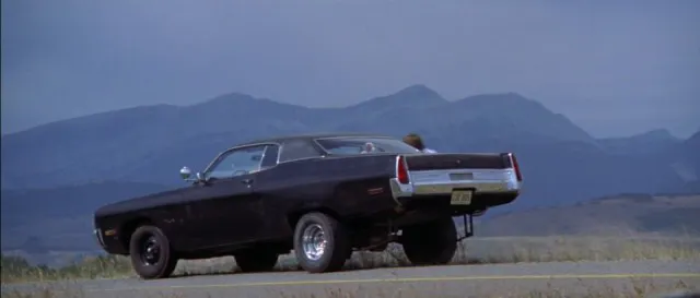 The jacked-up 1973 Plymouth Fury III.