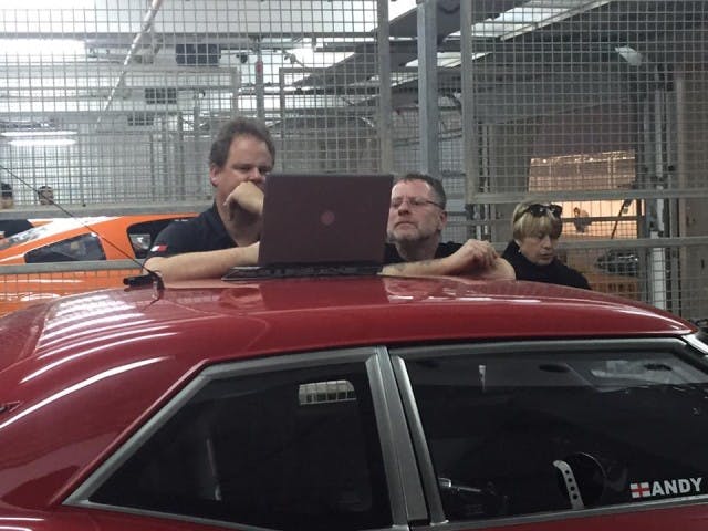 Andy (right) and Shane Tecklenburg poring over the data on the computer and getting RV3 ready for another lap. Tecklenburg has been instrumental in getting the team to Bahrain and in its on-track successes.