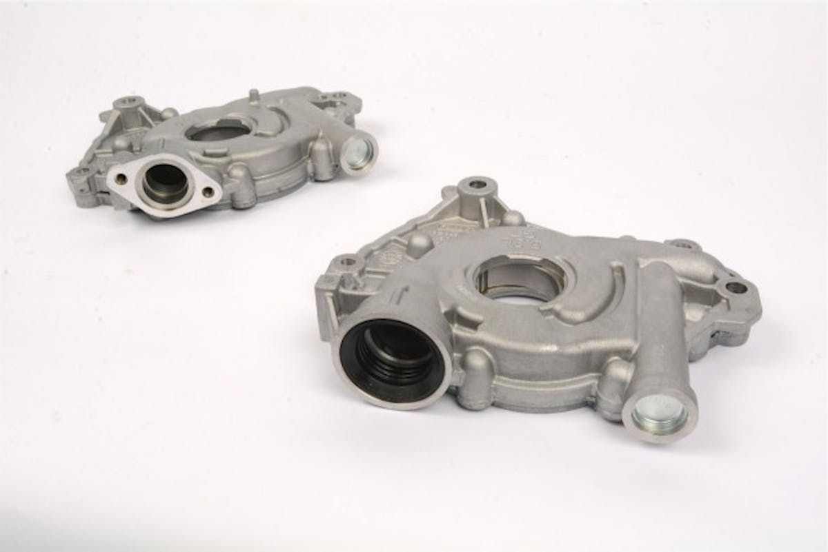 The Coyote oil pump (left) is easily identifiable by the two-bolt boss for the pickup tube. The Voodoo pump at right uses a rubber socket instead. The Voodoo inlet is also larger—1.250 vs. 1.0 inches—and boasts billet gears instead of the Coyote’s cast gerotor set.