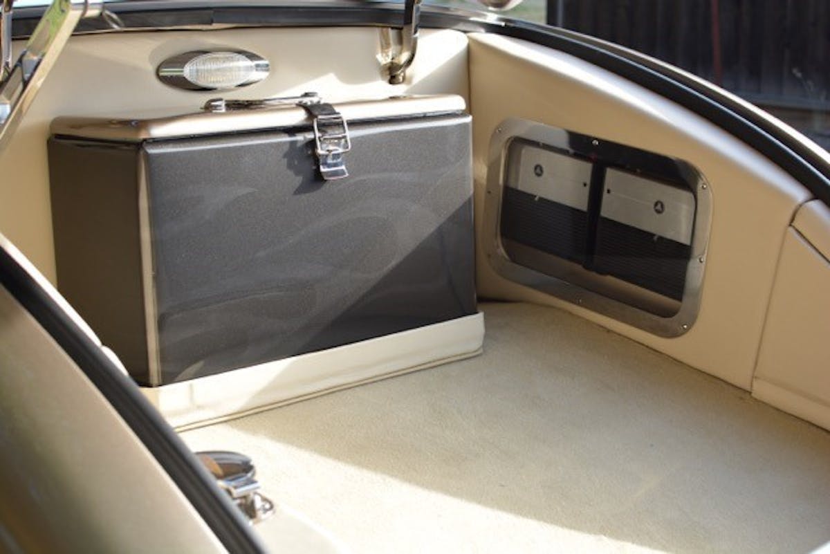 A vintage Pepsi cooler was refinished in matching paint with the same ghost flames. The extra touch just adds to the level of commitment Coria and his friends had to the build.