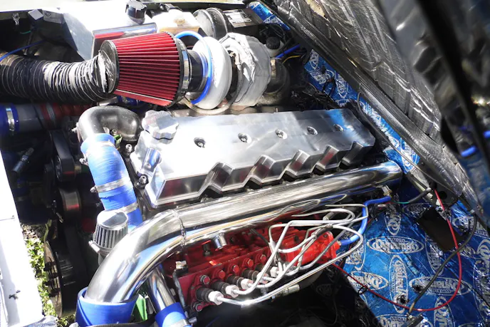 The motor as it sits today, armed with an S475 turbo, Hamilton camshaft, ARP head studs and rod bolts, custom intake, and more.