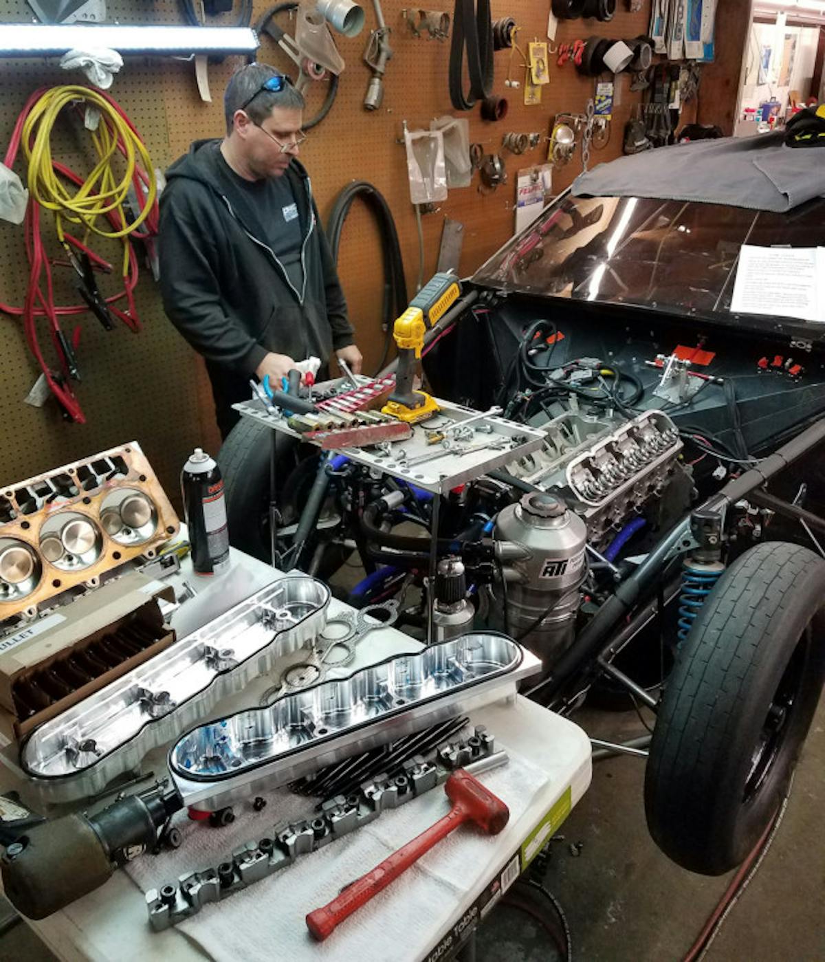 Shawn Miller (pictured) with the newly-installed LSX powerplant that he built at his