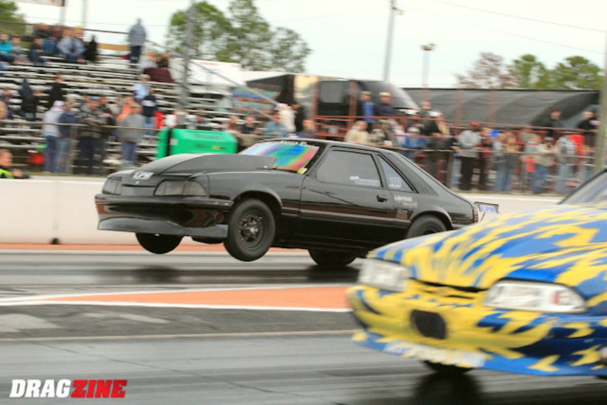 Walter Drakeford broke a center section earlier today before coming back in the last session to score eighth spot on the Ultra Street ladder with a 5.02 at 128 after this wheels up launch. You can see the nose of the number two qualified ATF Speed car of Mike Freeman out of Lehigh, Florida.