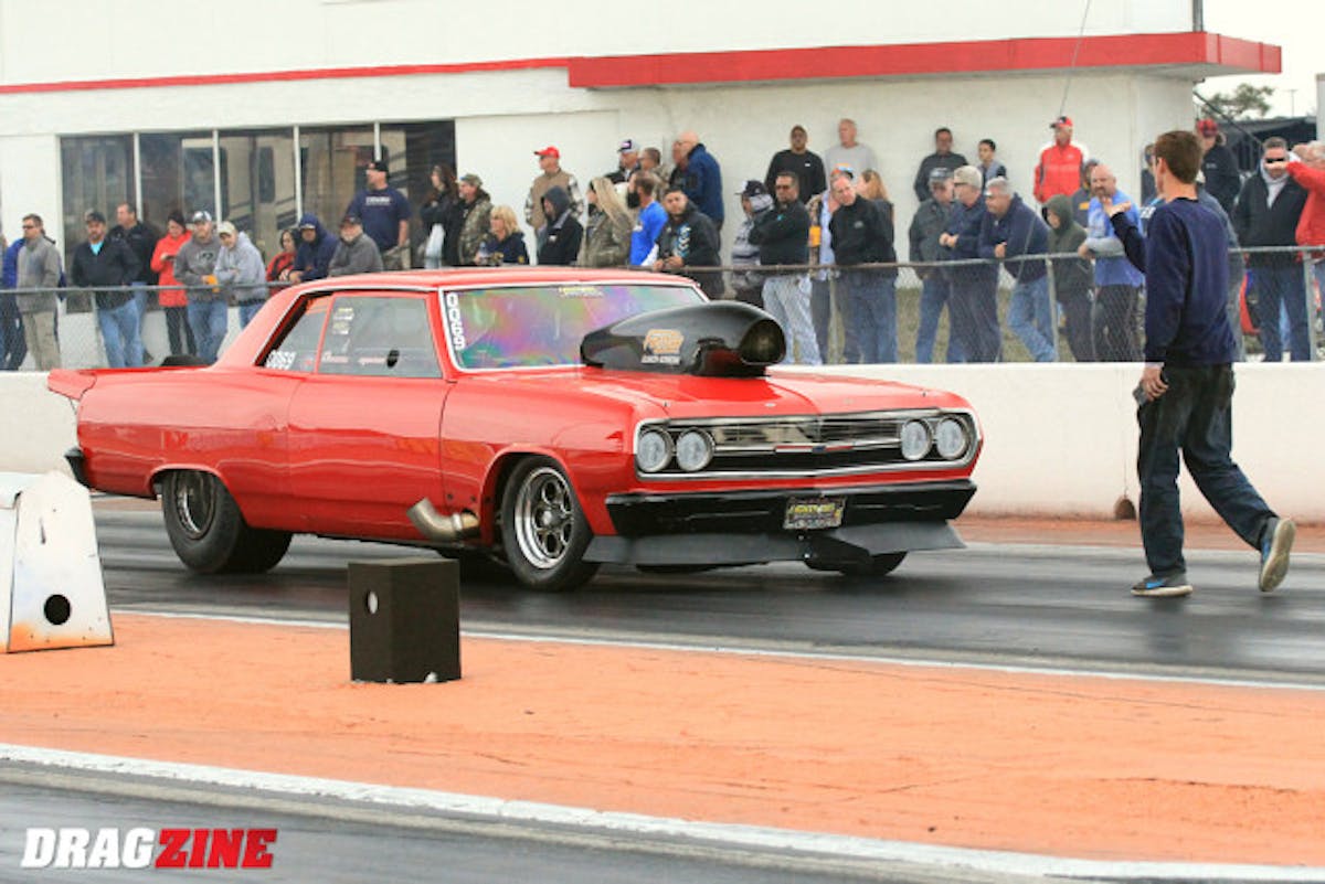 Dominic Augustine hails from Moorseville, NC with his 65 Chevelle sporting only a 598 inch big Chevy power plant. Small engine and small tires works just fine for him after landing second with a 4.392.