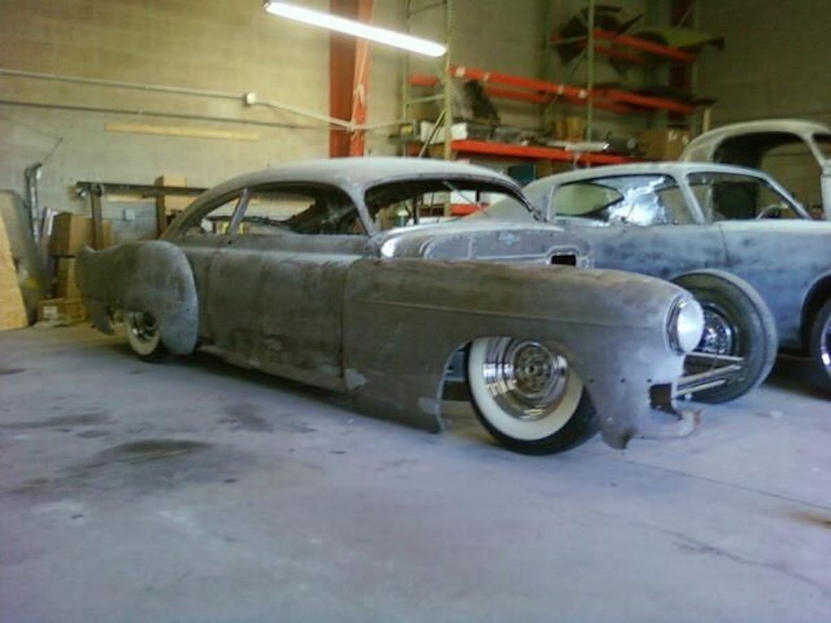 The ’49 Cadillac Sedanet as it approached body work completion. James had the car chopped, sectioned and suspension modified. Note how much had been removed in the sectioning process at the lower front fender.
