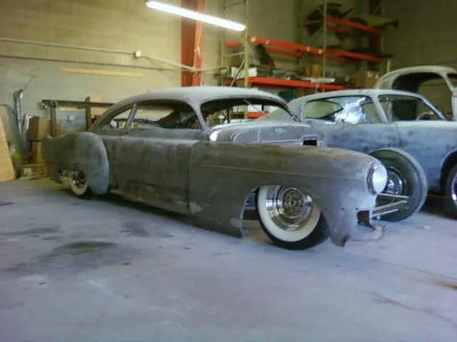 The ’49 Cadillac Sedanet as it approached body work completion. James had the car chopped, sectioned and suspension modified. Note how much had been removed in the sectioning process at the lower front fender.