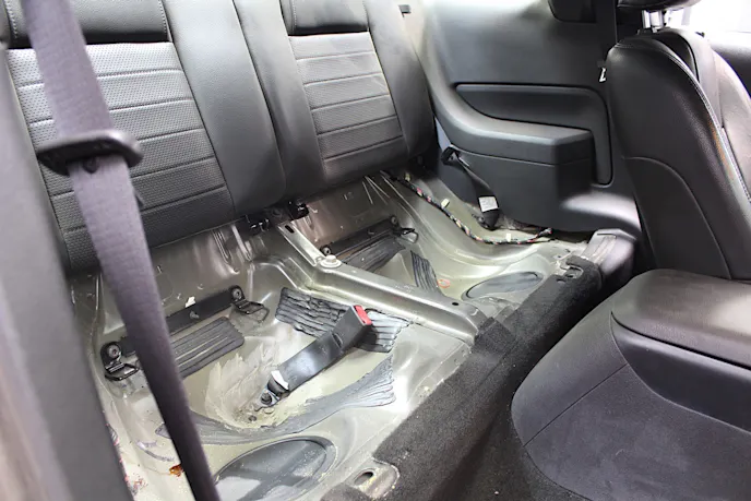 Installing the rear suspension requires you to remove the rear seats. It's up to you if you want to replace them when all is said and done!