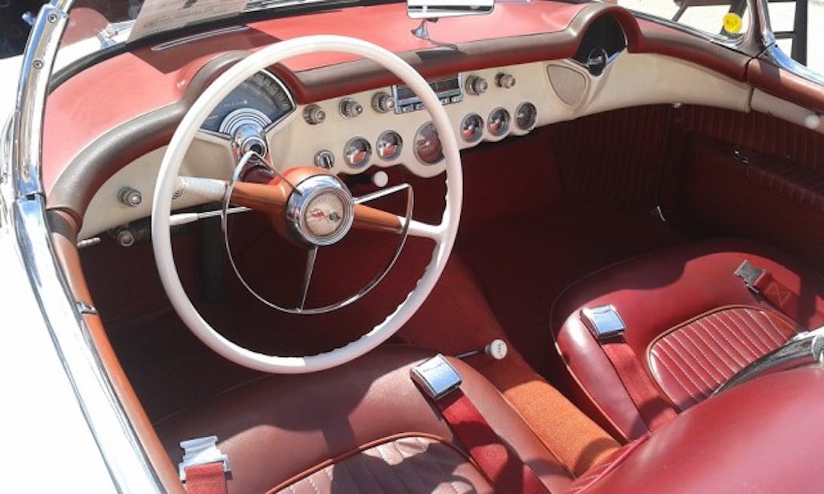Polo White with red interior is a hard combination to beat. The interior is all original, with the exception of the seat belts, that were added for safety.