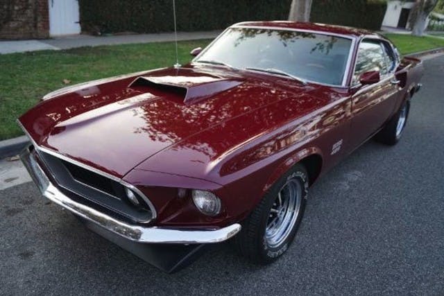 From the outside, this '69 Mustang Sportsroof looks identical to a 1969 Boss 429. It's only when you take a look under the hood where you'll find it to be on heck of a tribute.