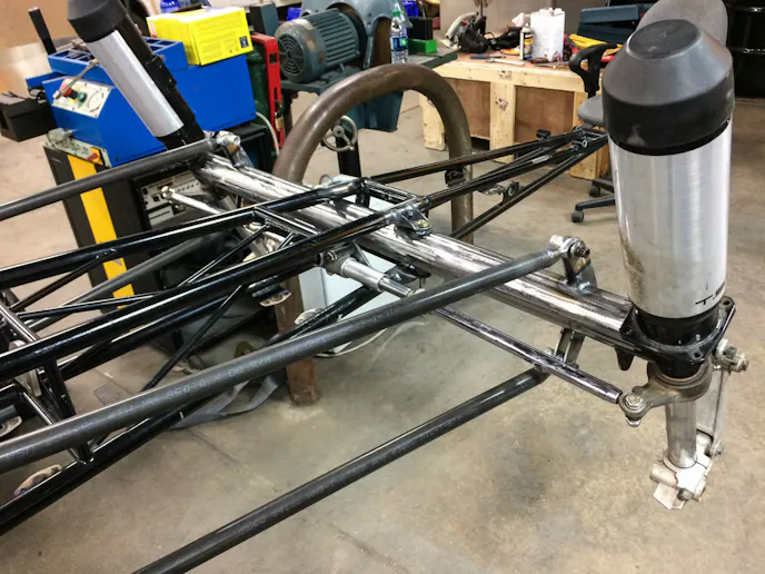 Another view of the front suspension during the construction process.