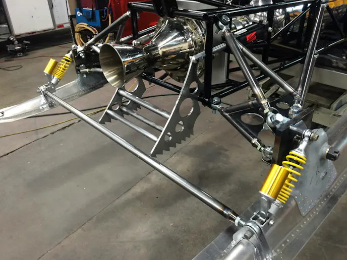 The propulsion force will be slowed through a combination of crossform parachutes and this innovative ice brake design, which is actuated from inside the cockpit.