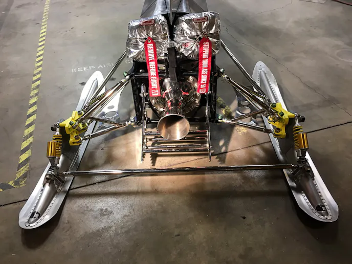 The moneymaker, suspended atop a set of Aero Force plane skis at the rear of the rocket craft.