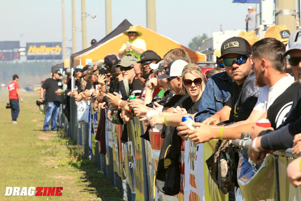 The fence is lined with people today and the stands are quite full today with people from across the world on site to catch the action.
