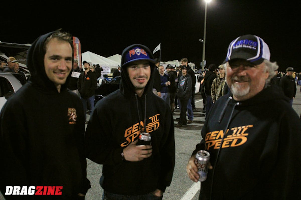 Jordan Lazic, Mark Jakab and Roy Lazic (from left to right) made the trip from the west coast of Canada with the “Radial Flyer” 1968 Nova owned by Jay Siverson to compete in Pro 275. The car is powered by a 648 cubic inch Big Duke style Chevy backed by a Rossler transmission and topped with two stages of NOS with a Holley EFI system. They had a twisted route to get here via Arizona to meet up with some other people and some testing time in Memphis, overall a seventy-one hour drive. They definitely win the continental driving long distance award to get here. Lazic is sitting sixteenth in class with a  4.75 at 153 MPH. The crew also changed the injector position in the intake here on site with the assistance of Mac Fab to weld new bungs in the intake at a lower position resulting in the improved performance.