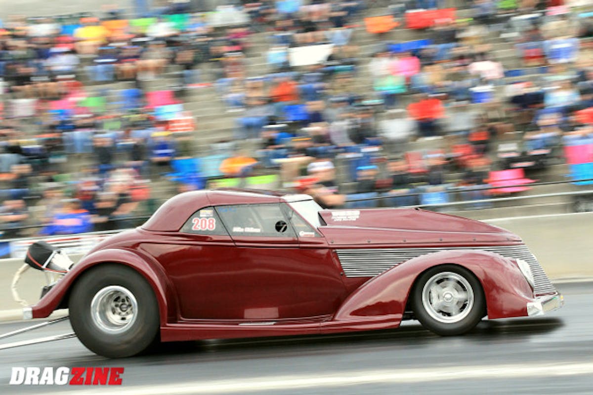A fan favorite is this 1937 Chevy owned by Mike Oldham. The car enjoys full street legal status with tail lights and turn signals and sees actual street duty quite often. He is qualified with a  4.88 at 140 MPH so far in eighteenth position.