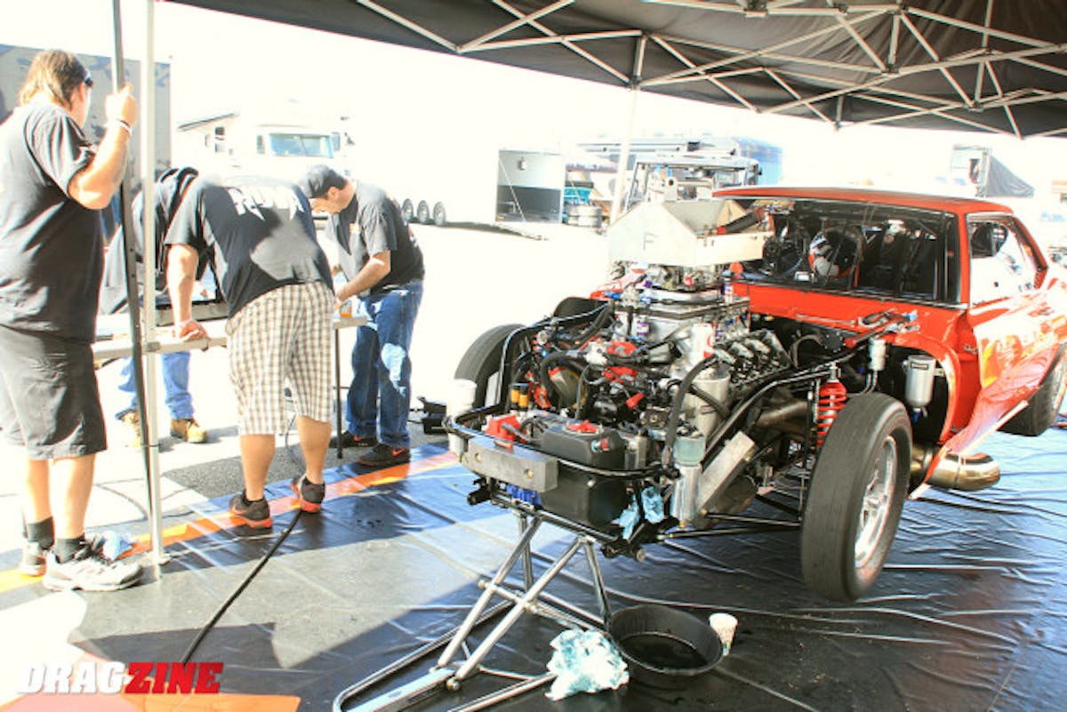 Ken Quartuccio's performance this weekend has set tongues wagging , especially after his 4.28 last night in round one eliminations. We spoke to Ken about his performance and the talk this morning where discounted the criticism. “What people don't understand is I've have raced down in Florida three or fours years, I been racing twenty-five years with nitrous 632 stuff and the last two weeks we raced we have raced in better air than we ever have raced in in Florida....we are racing on the best track prep for a radial tire and people need to take that in consideration, it's the trap prep and the air, that's it.” Ken Quartuccio. The crew was replacing a broken valve spring this morning and checking the valve train over thoroughly. 