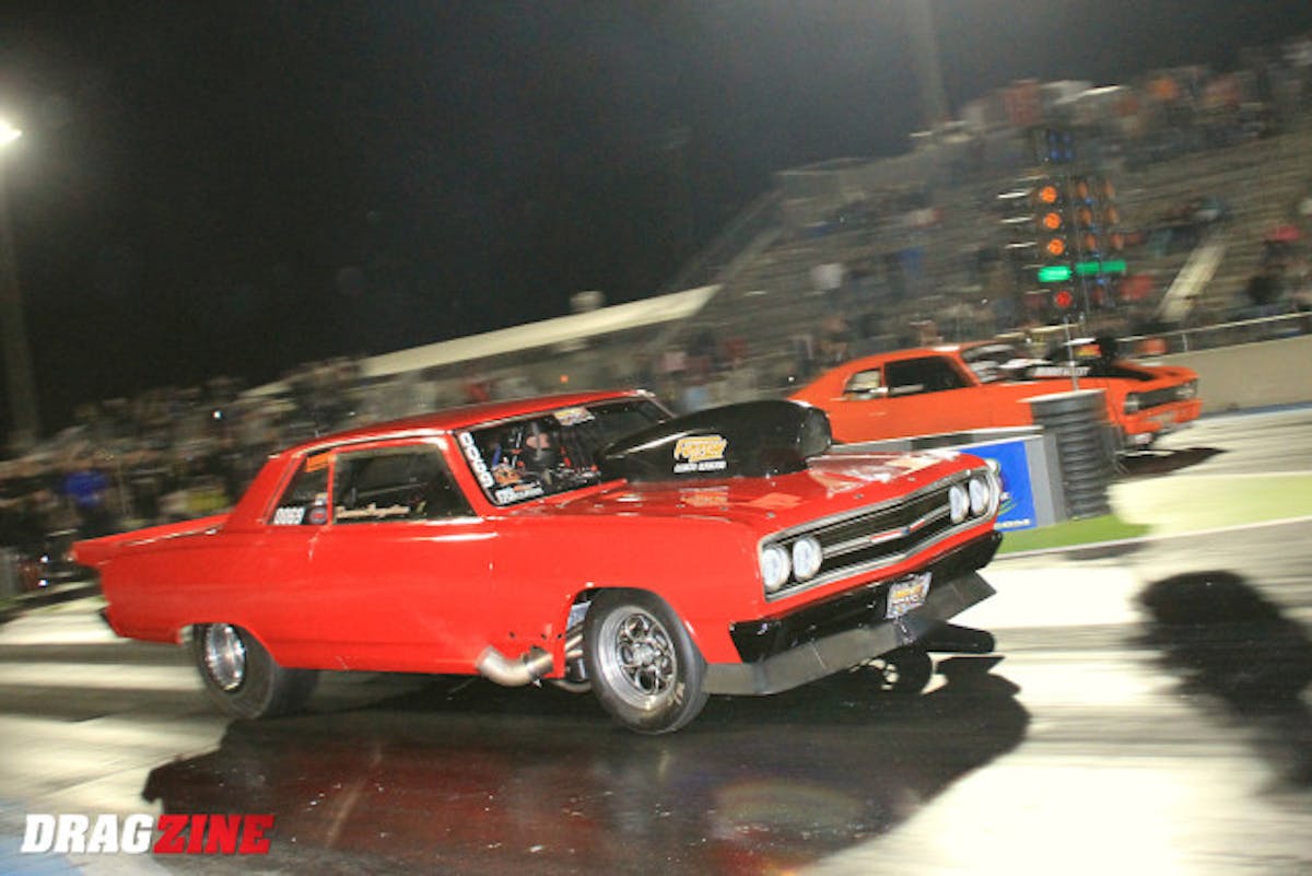 Outlaw 632 is a fast growing class with a wide variety of cars competing on big and small tires, stock suspension to former mountain motor Pro Stock cars running side by side. Here the radial is favored due to the tight track conditions with several big tire racers now making the switch including top qualifier and new record holder Ken Quartuccio, with his 4.284 Saturday night. He took himself out in round two with a red light easing the minds of some other racers in the hunt. Number two qualifier Dominic Augustine was running consistent 4.40's weeding his way through the field and making opponents nervous as both Mike Oldham and Cory Cox out of the Voss racing camp went red looking for an advantage. Kenny Hubbard was on the other side of the ladder qualifying fourth, running a best in this class of 4.400  at 160 over Jim Aldous in round three overcoming Aldous' .017 reaction, 4.51 performance. The final would be two small tire cars with Augustine taking the starting line with a .041 to Hubbard's .077, though he slowed to a 7.59 after spinning the tires while Augustine put up a 4.403 at 156 to earn the win.